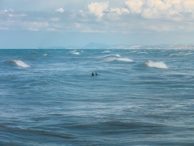 Surfers in Senigallia