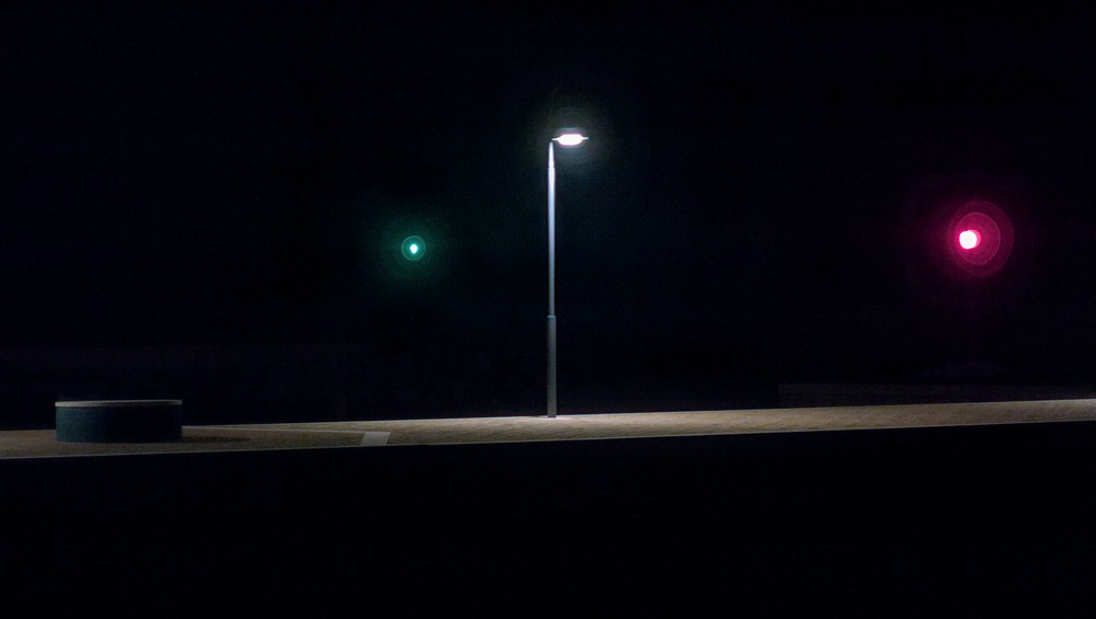 Street light and lighthouses at night