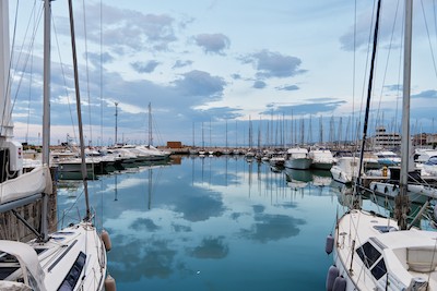 Touristic harbor at sunset