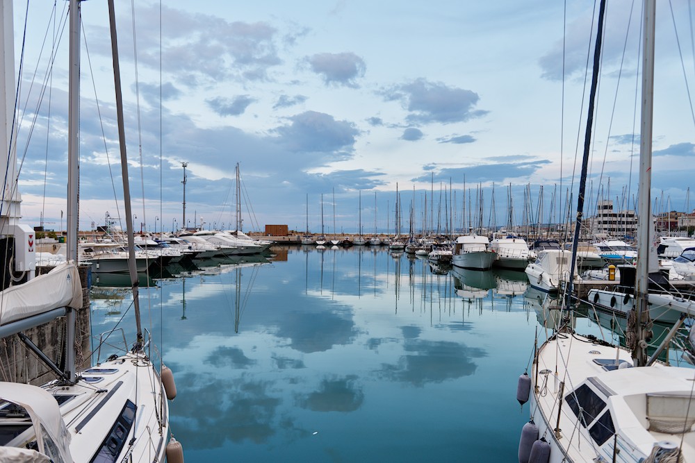 Touristic harbor at sunset