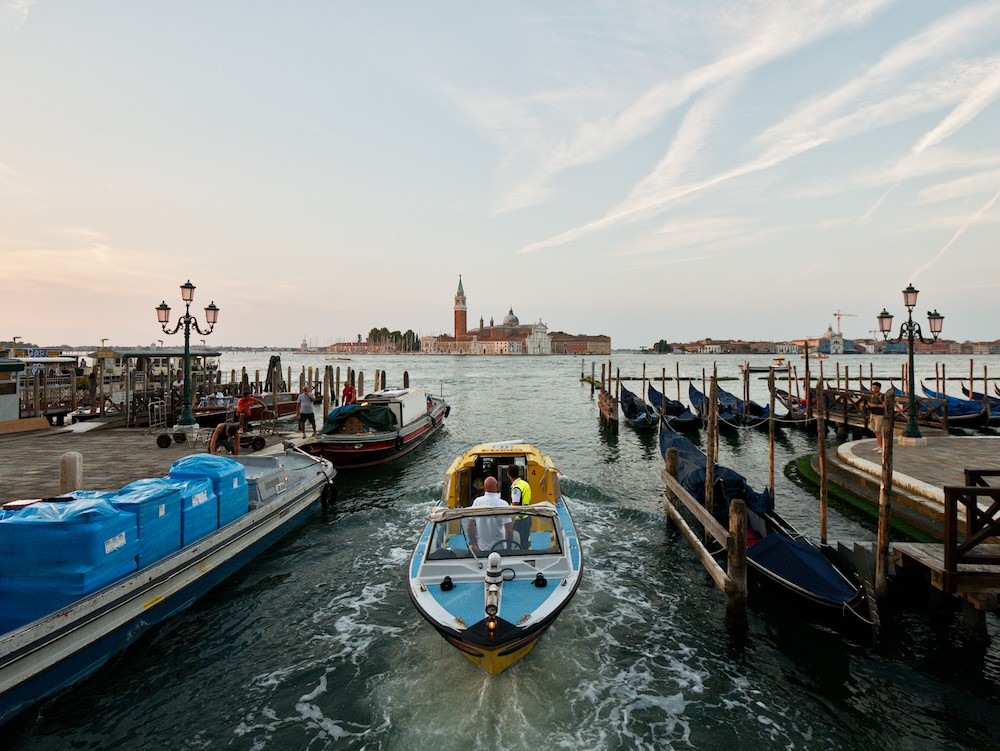 Passing boat at sunrise, with San Giorgio Maggiore church in the background