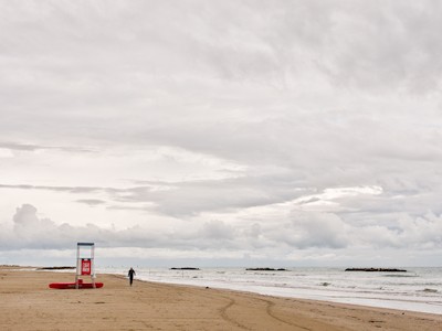 Walking on the beach at dusk