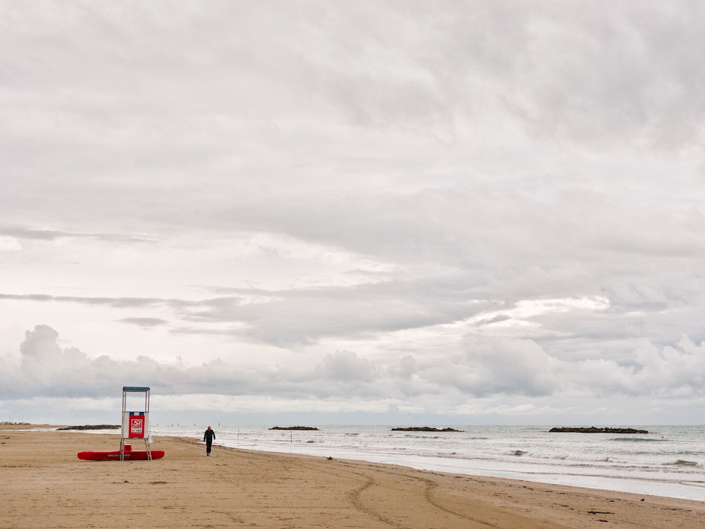 Walking on the beach at dusk