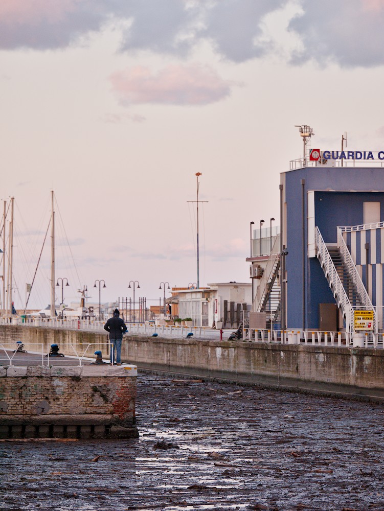 Harbor with marine debris at dusk