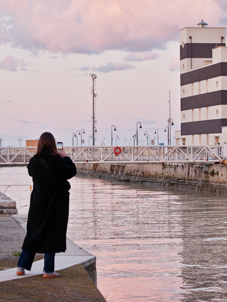Photographing the harbor at dusk