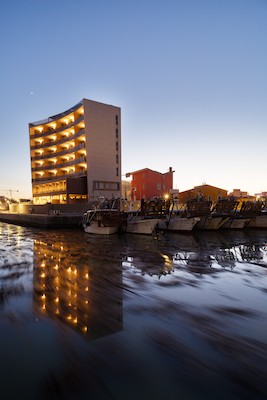 High-rise at the harbor at dusk