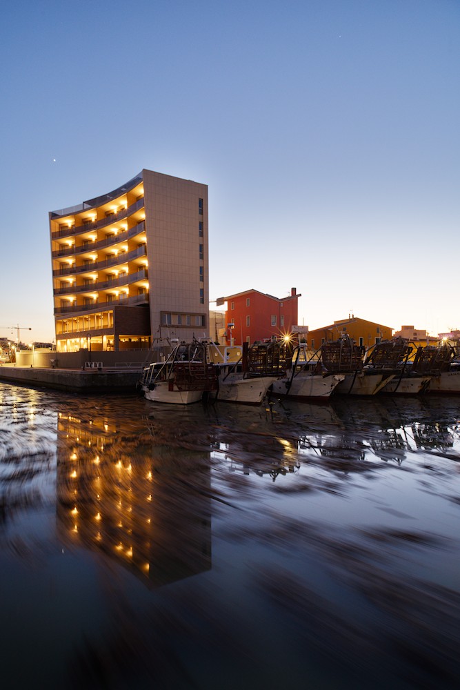 High-rise at the harbor at dusk