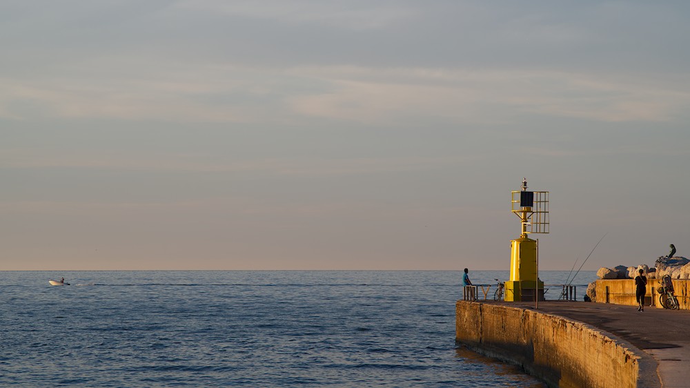 Yellow lighthouse at dusk
