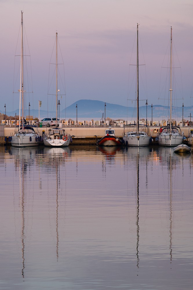 Sailboats reflection at dusk