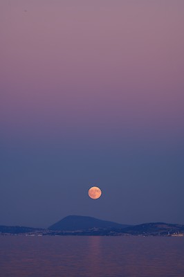 Moon over Mount Conero at dusk