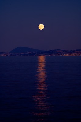 Moon over Mount Conero at dusk