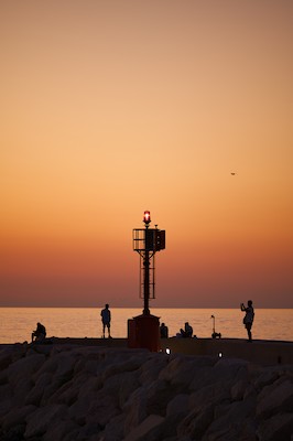Photographing at the harbor at sunset