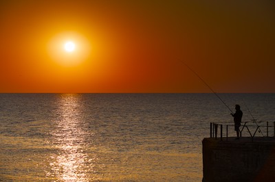 Fishing at sunrise