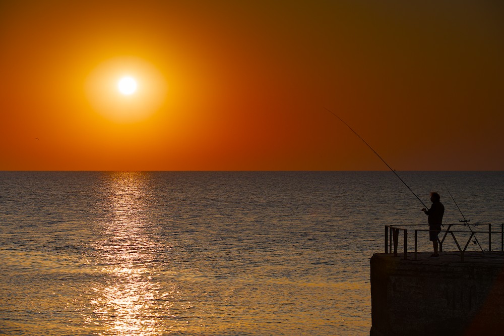 Fishing at sunrise